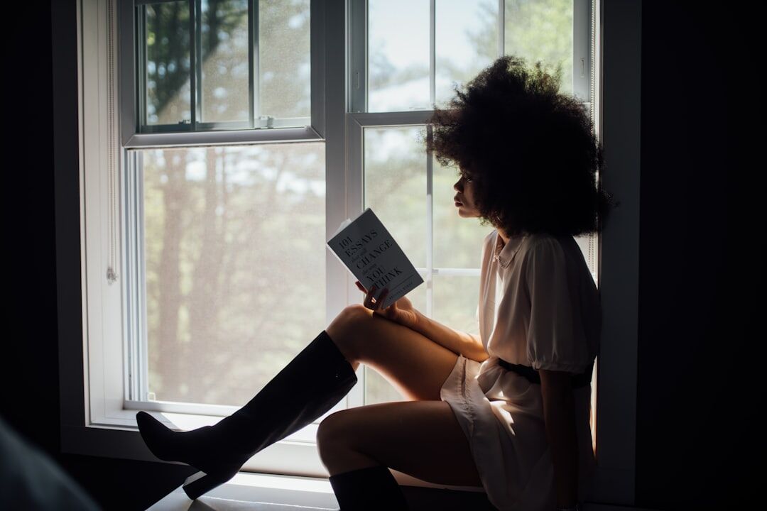 person reading book quietly
